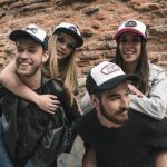 wearing baseball caps