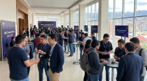 Attendees networking at AWS Community Day Bolivia 2026 event venue