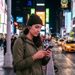 Tourist wearing translation earbuds in Times Square New York